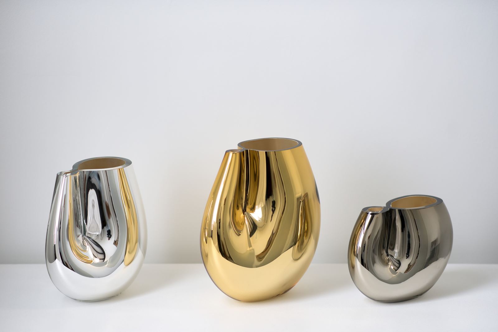 from left: medium/silver 11″H x 10″W (28x25cm), large/gold 13″H x 10″W (33x25cm), small/pewter 7.5″H x 10″W (19x25cm)