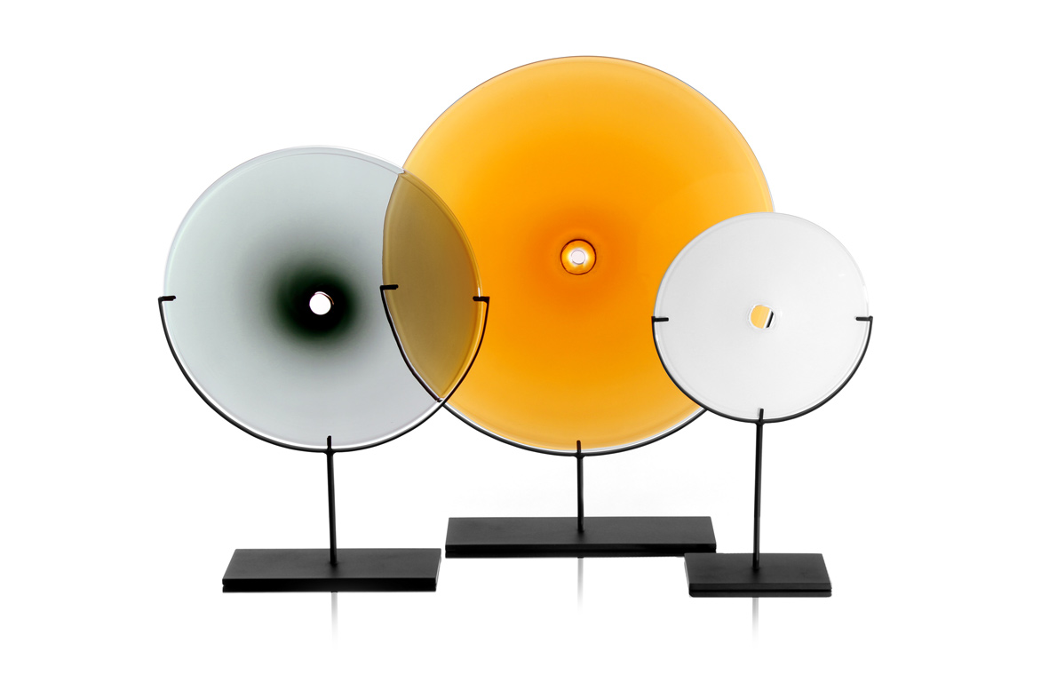 from left: medium/smoke 24″H x 18″W (61x46cm), large/amber 29″H x 24″W (74x61cm), small/white 21″H x 12″W (53x30cm), all shown w/ dark oxidized steel stand